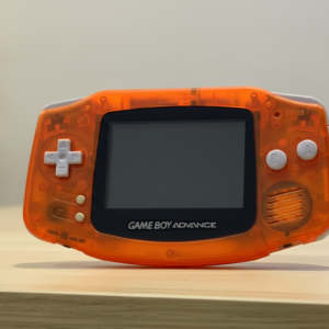 Game Boy Advance - Orange Transparente (Édition Wario) - Remise à Neuf